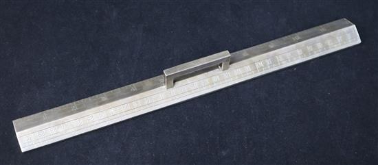 A George V silver ruler by John Collard Vickery, London, 1926, weighted.